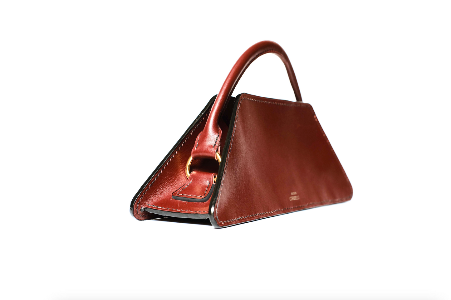 Elie mini bag, side view, Model, Studio, Burgundy, Clutch bag, Hand bag, mediterranean vibe, Premium leather, Unique design, Maison Corbelli, Luxury