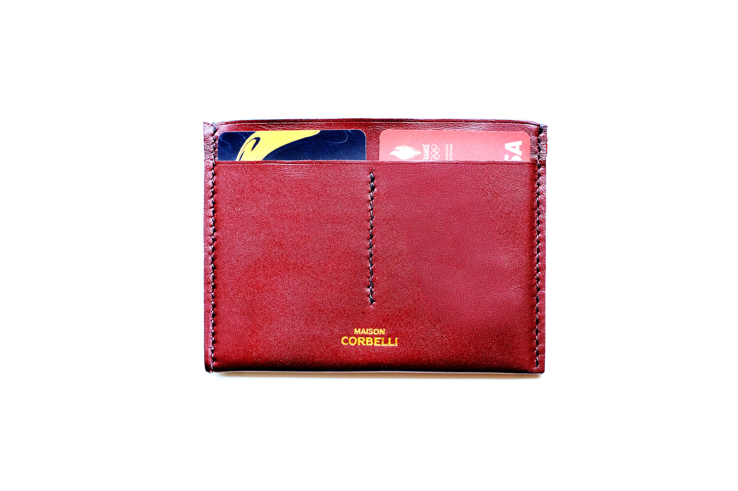 One wallet, cognac colour, on a white background, Wally wallet, top view, Pure leather, black colour, Passport size, studio photo,