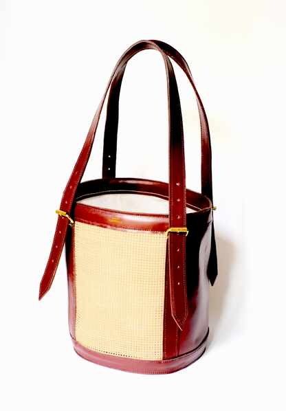 Alma bag, side view, Model, Studio, Burgundy, bucket bag, Hand bag, Rattan, mediterranean vibe, Premium leather, Unique design, Maison Corbelli, Luxury, grain calf leather
