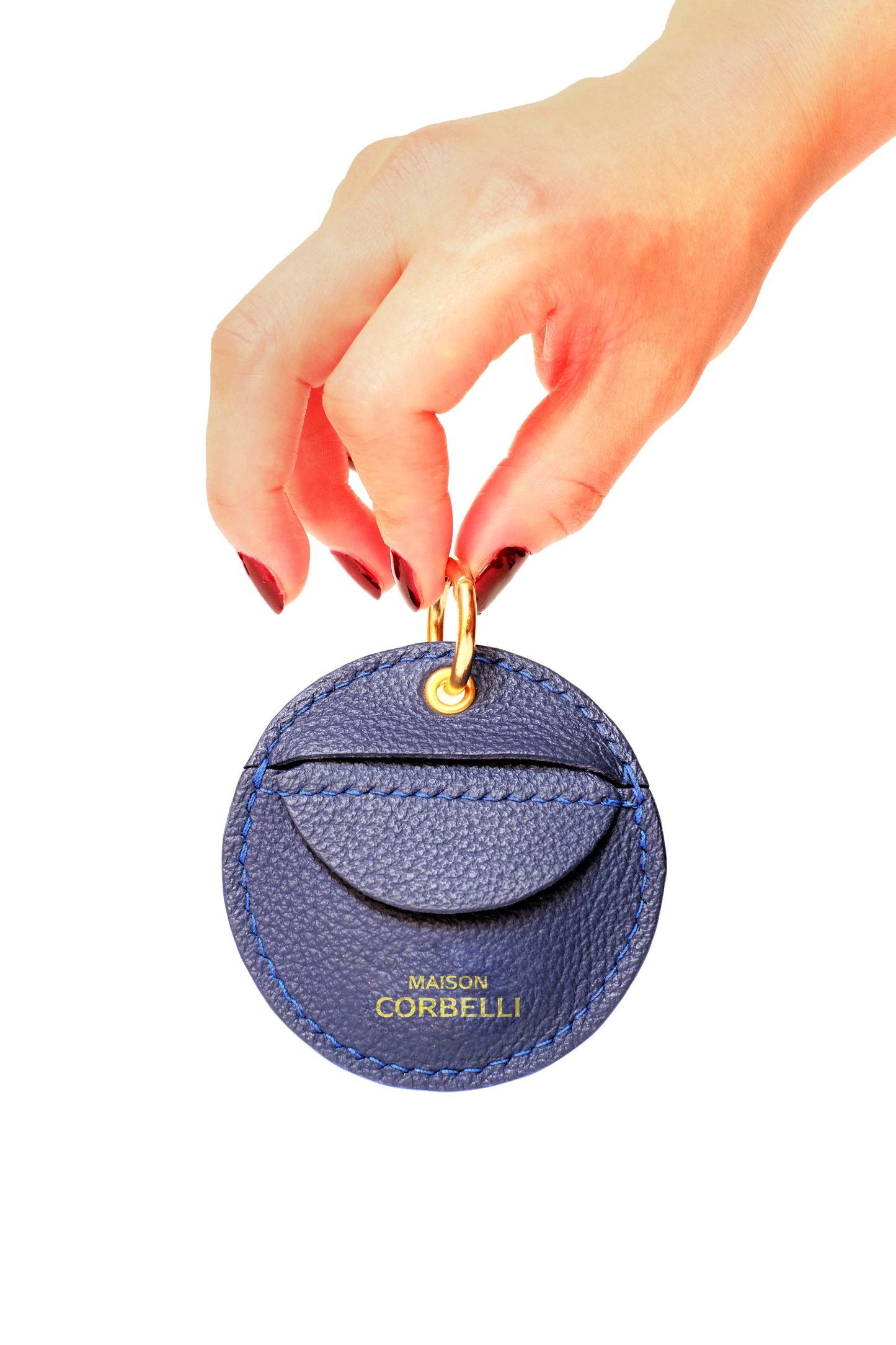 Oto, coin holder, gold-colored accessories, coin purse, front view, hand Model, Studio, Blue, bag, mediterranean vibe, Premium leather, Unique design, Maison Corbelli, Luxury, grain calf leather