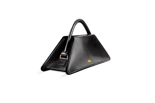 Elie mini bag, side view, Model, Studio, Black, Clutch bag, Hand bag, mediterranean vibe, Premium leather, Unique design, Maison Corbelli, Luxury, White background